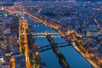 Fototapeta na wymiar Panorama of Paris in the evening from the height of bird flight at sunset
