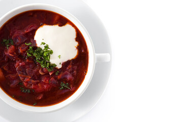 Traditional Ukrainian Russian borsch. Beetroot soup isolated on white background. Top view