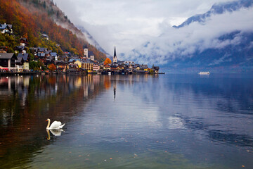 Fototapeta premium Hallstatt town view in a foggy day and clouds between the mountains, Austria.