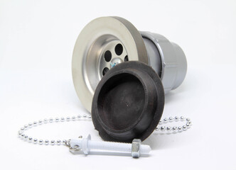 Bath sink plughole set and rubber plug with chain on white background.