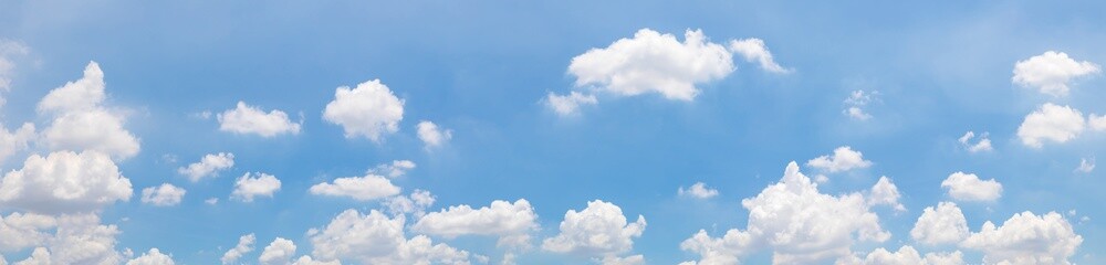 Panorama or panoramic photo of blue sky and white clouds or cloudscape.