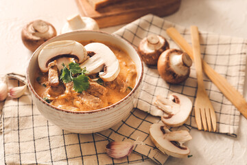 Tasty beef stroganoff in bowl on table