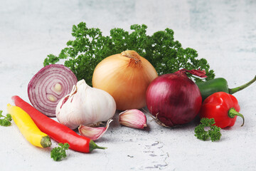 Different spices: onion. garlic, parsley and pepper