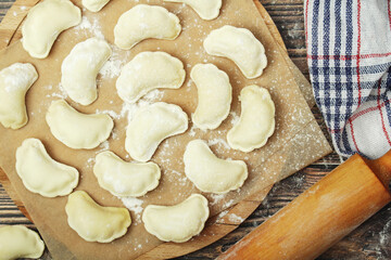 The process of cooking traditional vareniki - textured background