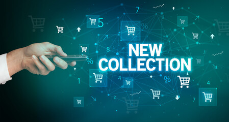 hand holding wireless peripheral with NEW COLLECTION inscription, online shopping concept