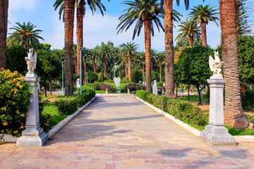 Paved pedestrian road in municipal garden in Chios island, Greece