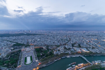 Fototapeta premium Panorama of Paris in the evening from the height of bird flight at sunset