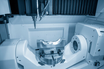 The 5 axis CNC machining center cutting the automotive mold parts with solid ball endmill tools....