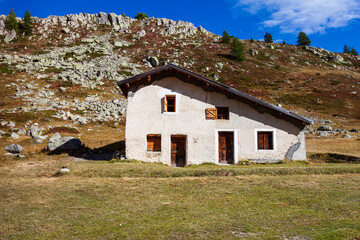 Fototapeta na wymiar Traditional cottage mountain house in Alps Mountains. Rural rustic architecture, France, Europe.