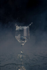 A splash with water and ice on a black background