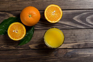 orange juice and sliced ​​orange. a glass of orange juice,
