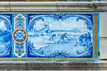 panel of azulejos on a traditional facade in the Algarve