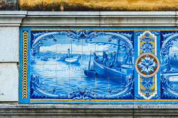 panel of azulejos on a traditional facade in the Algarve