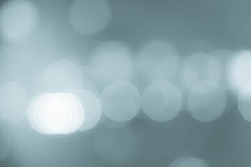 Gray and white bokeh lights defocused, Abstract blurred background.