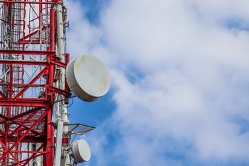 Antennas, telecommunications, Internet communications, against the cloud sky