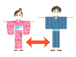 ソーシャルディスタンス　マスクをつけた浴衣の女の子と男の子