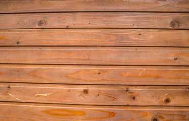 Brown natural horizontal wooden boards texture and background.