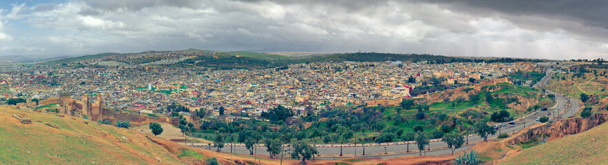 Fototapeta na wymiar Cloudy winter day in Fes, Morocco. Panoramic cityscape