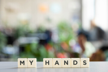 Fototapeta premium white cubes with my hands lettering on white surface