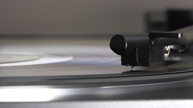 Record player turntable needle drop - close up