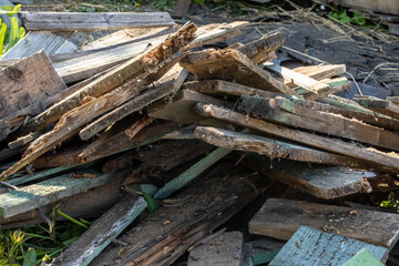 Fototapeta na wymiar a pile of old wooden planks