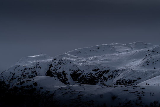 Glossy shadowed peaks.