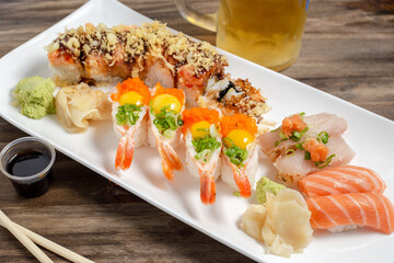 Sushi platter with shrimp boats,  tuna, salmon and sushi roll