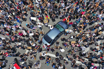 Protestors gathered at a crosswalk aerial shot