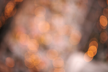 Fototapeta premium Decorated Christmas tree on blurred, sparkling and fairy background