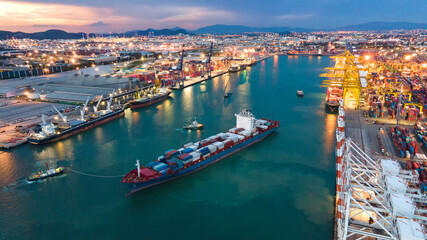 Container ship in export and import business and logistics. Shipping cargo to harbor by crane. Water transport International. Aerial view and top view.