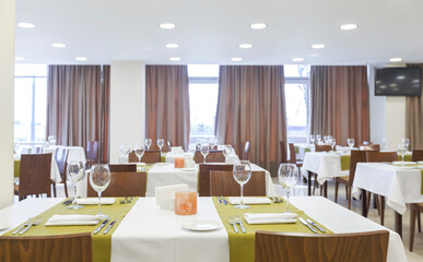 Hotel restaurant design with candles on tables