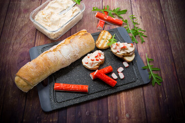 cheese sandwich and crab sticks on top