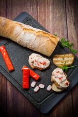 cheese sandwich and crab sticks on top