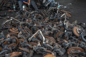 used brake rotor and car part at junkyard or scrapyard for recycling