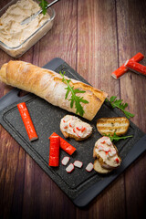 cheese sandwich and crab sticks on top