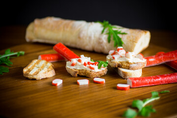 cheese sandwich and crab sticks on top