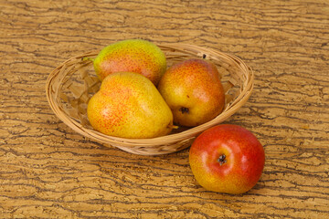 Pear heap in the wooden basket