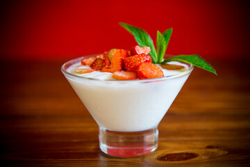 sweet homemade yogurt with red ripe fresh strawberries