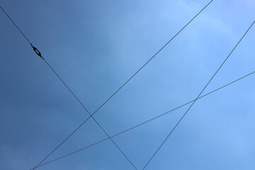 power lines on blue sky