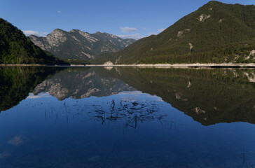 Fototapeta premium The beautiful morning landscape of the Redona Lake, Italy