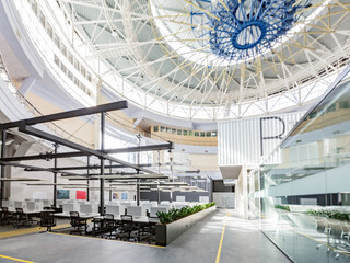 Big rental office with wrapped computers, no workers, copy space