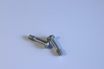 bolts on a white table