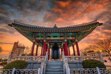 Busan, South Korea, February 22, 2020: View of Busan tower and Yongdusan Park the most popular tourist attractions at sunset in Busan, South Korea. - obrazy, fototapety, plakaty