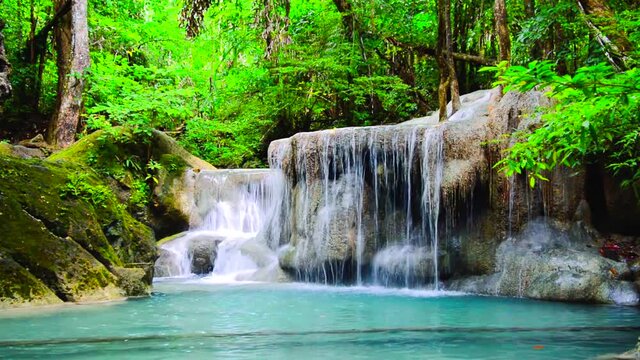 Beautiful nature footage video of Erawan Waterfall in tropical rain forest at Kanchanaburi province, Thailand