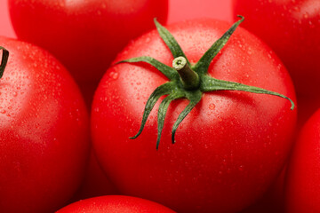 Fresh ripe tomatoes on whole background, macro