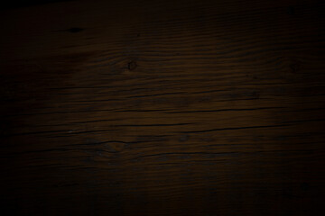 Empty dark wood background to insert. space for text..