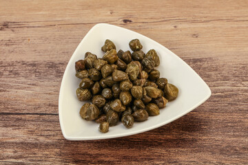 Tasty capers in the bowl