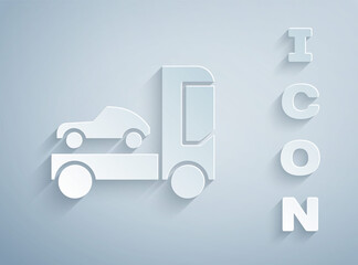 Paper cut Car transporter truck for transportation of car icon isolated on grey background. Paper art style. Vector Illustration