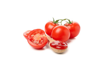 Tomatoes and spoon with sauce isolated on white background