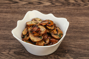 Roasted champignon with herbs and spices